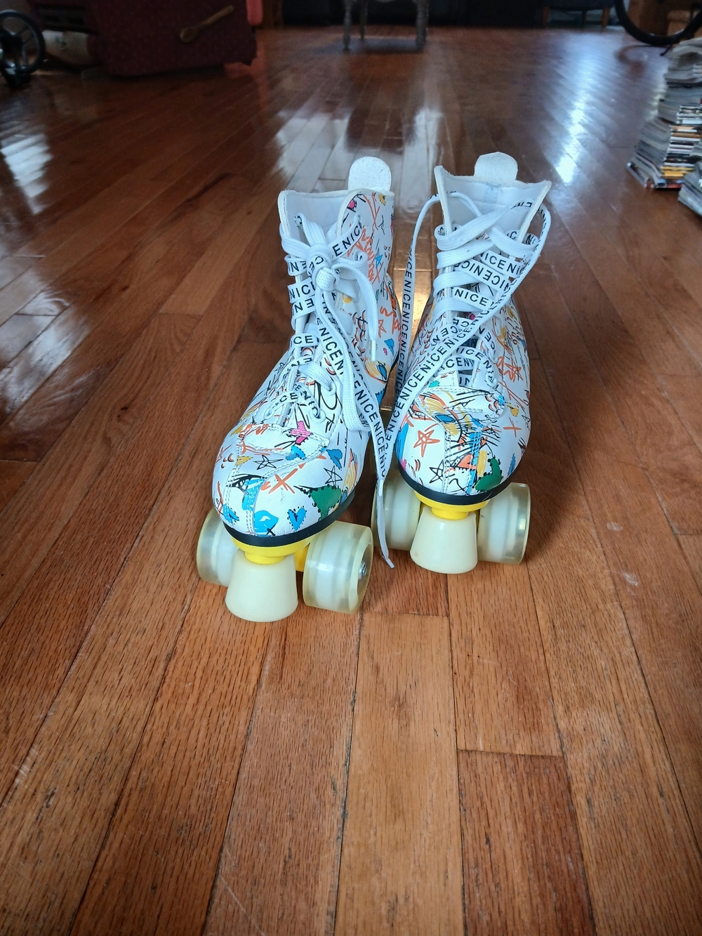 White Multi-Color Graphic Women's Roller Skate Sneakers with Branded Ribbon
